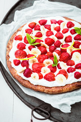 Healthy strawberry and banana tart with cream