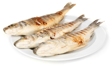 Delicious grilled fish on plate isolated on white