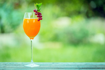 Elegant glass of fresh orange juice