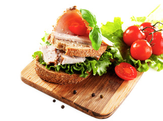 Delicious sandwiches with meet isolated on white