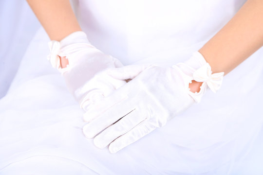 Wedding gloves on  hands of bride, close-up