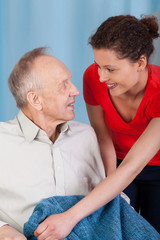 Woman caring about disabled man