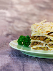 South African boboti layered with pancakes