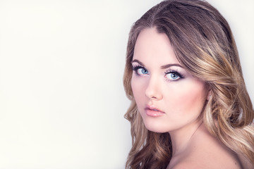 Naklejka premium beautiful girl with makeup on white background
