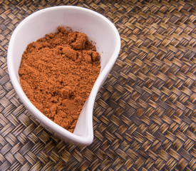 Cocoa powder for making drinks in a white ceramic