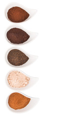 Cocoa powder, dried tea leaves and grounded coffee in ceramic