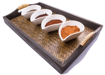 Cocoa powder, dried tea leaves and grounded coffee