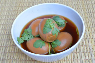 Khai Phalo or braised pork soup with duck eggs