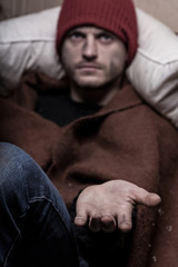 Fototapeta premium Man begging for money