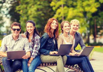 Fototapeta na wymiar group of students or teenagers hanging out