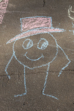 drawing with chalk on asphalt