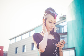 young beautiful punk dark girl listening music