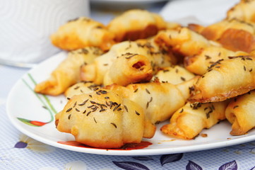Salty bakery products on plate
