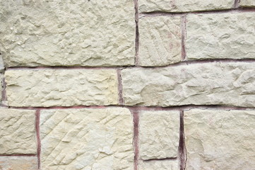 Stony wall with uneven structure