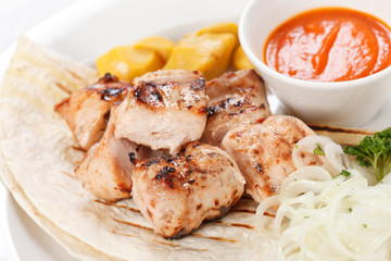 chicken with tortilla and sauce