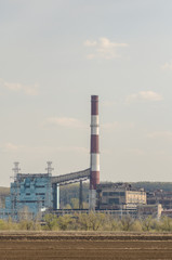 Fototapeta na wymiar High chimney pipe Heat Electric station