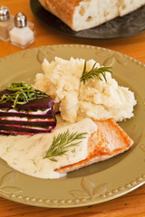 organic salmon in dill sauce with mashed potatoes and beets
