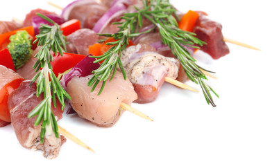 Raw pork kebab isolated on white