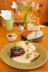 organic salmon in dill sauce with mashed potatoes and beets