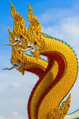 Fototapeta na wymiar Thai style dragon statue sky background