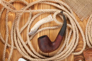 Tobacco pipe and rope