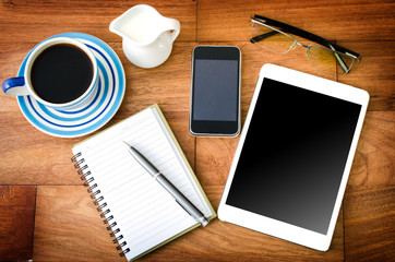 tablet pc and a coffee and Mobile phone