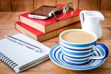 Cup of coffee and Mobile phone