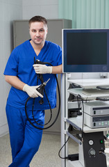 Young endoscope doctor in examine room