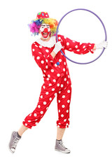 Male clown holding a hula hoop