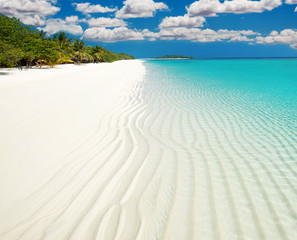Clear white sand on Maldives island coast