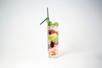 Delicious cocktail with fruits