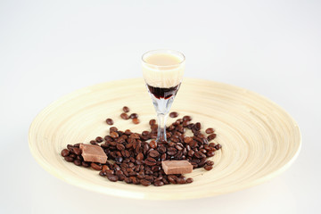 Delicious coffee cocktail with coffee beans and chocolate