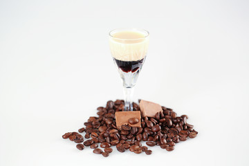 Delicious coffee cocktail with coffee beans and chocolate