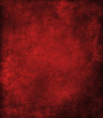 Grunge texture of a dilapidated wall in a red tone