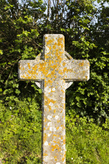A stone cross grave stone head stone in Devon, England