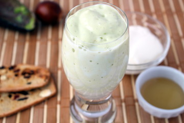 Avocado smoothie made with yogurt, milk and honey