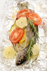 trout in aluminum foil baked