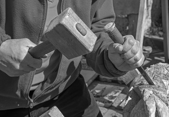 hands of carver at work © Renáta Sedmáková