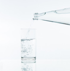 Pouring water on glass