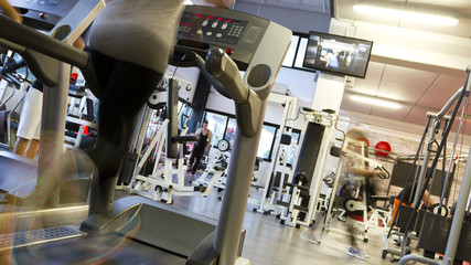 Fototapeta premium diverse equipment and machines at the gym room 
