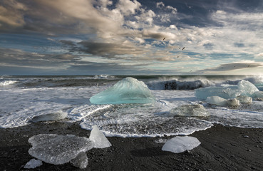 Melting Icebergs in the Sea - 64993734