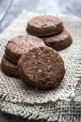 Fototapeta premium chocolate cookies over wooden background