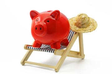 sparschwein mit sonnenliege