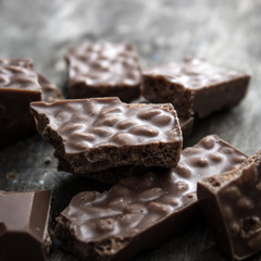 chocolate bars on wooden table