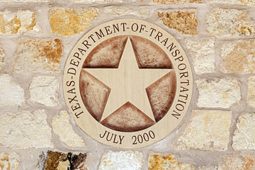 Texas Department of Transportation Symbol on the Sandstone Wall