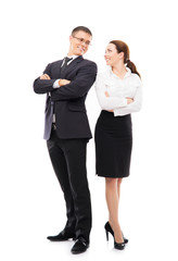 Couple of young business persons posing together on white