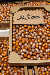 Naklejka premium Loose hazelnuts on the market