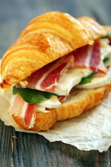 Sandwich with ham and cheese close up.