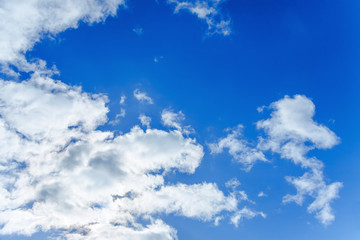 Naklejka na ściany i meble background from the blue sky with white clouds