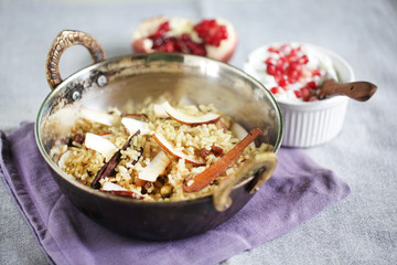 Vegetarian biryani with coconut, spices with pomegranate raita
